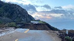 Photo from the morning of January 29, 2021, showing the washout of California's Highway 1, on the Big Sur Coast at Rat Creek, looking south. Debris flow from the Dolan Fire burn scar washed out a 150-foot section of roadway January 28, 2021, causing a full closure.